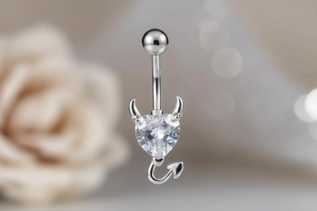 Navelpiercing hart duivelsstaart zilver transparant josujo stijl