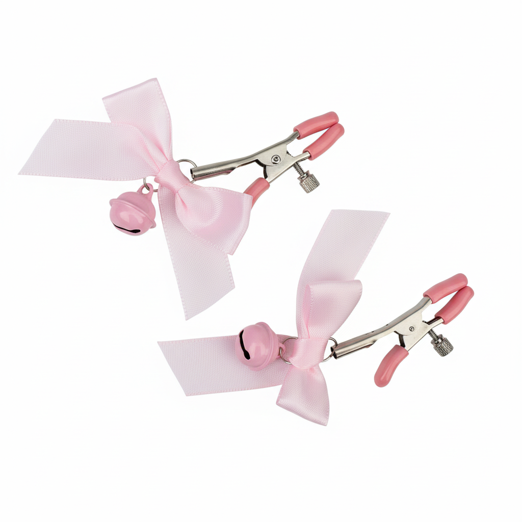 Roze tepelklemmen met belletjes en strik