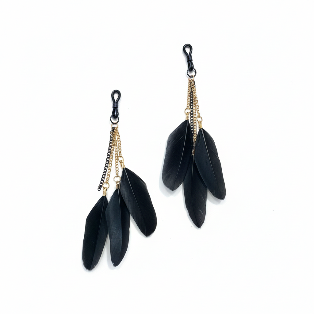 Zwarte veren tepelhangers met gouden en zilveren kettinkjes - josujo body jewelry