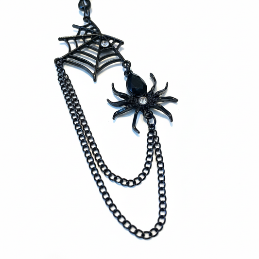 Spinnenweb tepelklemmen - close-up detail van spinnenweb en spin