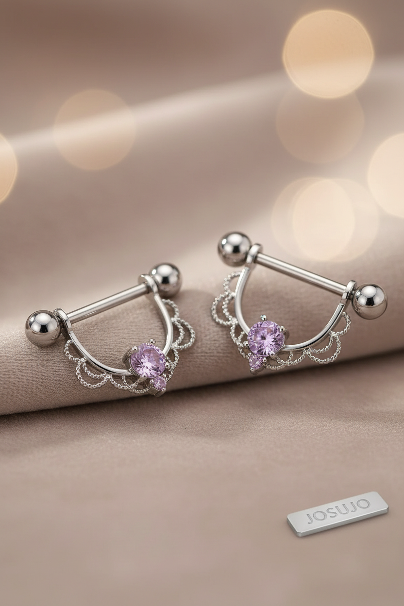 Tepel piercings met roze zirkonia