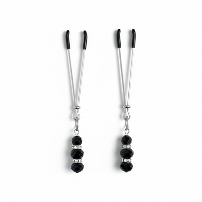 Kristallen tepelklemmen zwart met strass spacers - overzicht